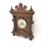 Late 19th century American 'Gingerbread' clock, twin train Ansonia movement striking on coil, H47cm