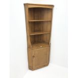 ercol light elm corner cabinet, two fixed shelves above single cupboard, W77cm, H180cm