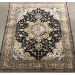 Fine Tabriz beige ground rug, repeating border, central medallion, 350 kpsi, 197cm x 143cm