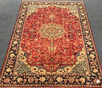 Keshan red ground rug, central medallion, repeating border, 314cm x 216cm