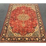 Keshan red ground rug, central medallion, repeating border, 314cm x 216cm