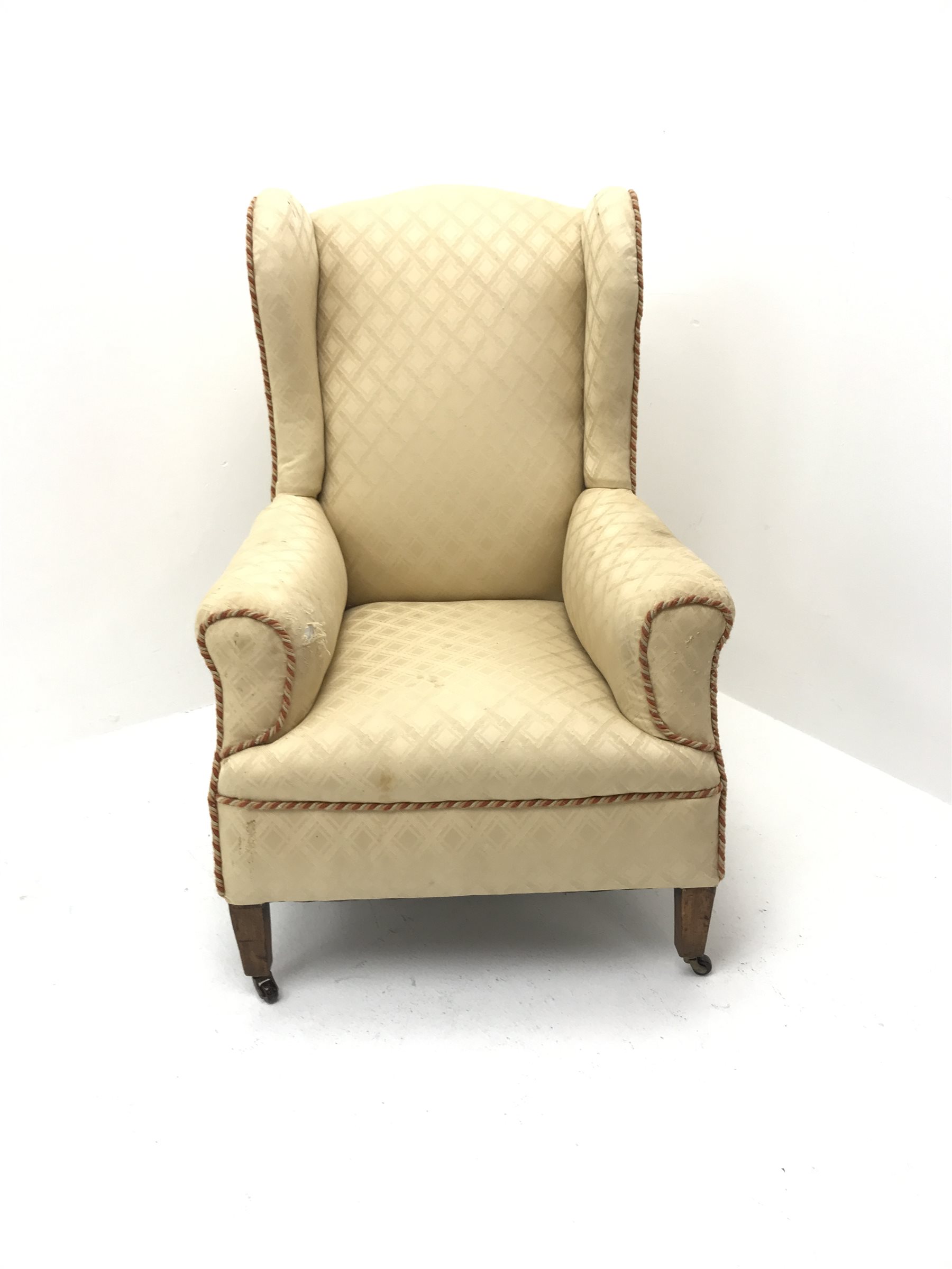 Early 20th century wing back armchair, upholstered in a beige fabric, square tapering supports, W72c - Image 2 of 4