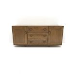 ercol light elm sideboard fitted with three drawers and two cupboards, W156cm, H68cm, D44cm