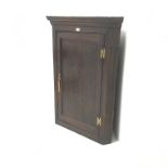 19th century oak corner cupboard, projecting cornice, single door enclosing three shelves and two tr