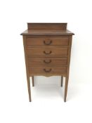 Edwardian mahogany music cabinet, raised back, four fall front drawers on square tapering supports,