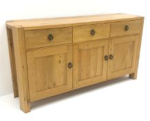Light oak sideboard, three drawers above three cupboards, stile supports, W165cm, H86cm, D45cm