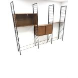 Staples Ladderax three bay sectional wall unit, two teak units comprising of solid and glazed slidin