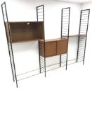Staples Ladderax three bay sectional wall unit, two teak units comprising of solid and glazed slidin