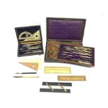 Two sets of early 20th century draughtmans brass and nickel drawing instruments, some with bone or