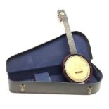 Early 20th century Keech Banjulele banjo, the ebonised back with etched 'signature' Alvin D. Keech,