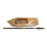 Battery powered model speedboat with blue and white painted wooden hull, simulated planked deck, two