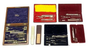 Victorian Stanley burr walnut cased set of nickel drawing instruments, some with turned ivory handle
