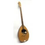 Eight-string bouzouki with segmented rosewood back and spruce top, L97cm