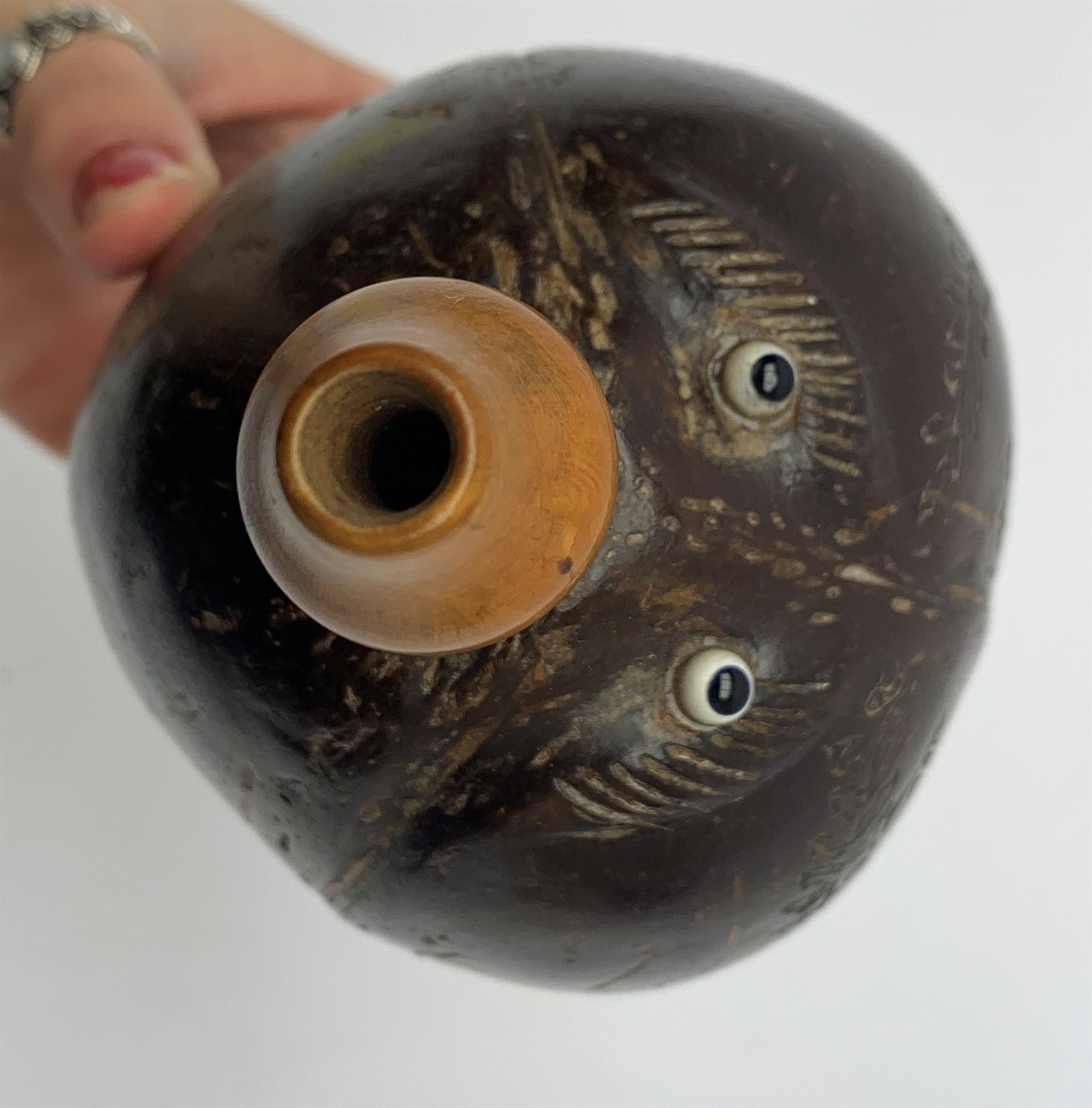 Napoleonic coconut bug bear flask with carved decoration and initials, inset glass eyes and turned b - Image 6 of 6