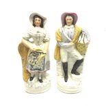 Pair of Victorian Staffordshire flat-back figures of a fishgirl and boy, each depicted standing with