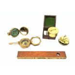 Brass Natural Sine type compass with spirit levels to the dial, bears name of Stanley, D8cm, in earl