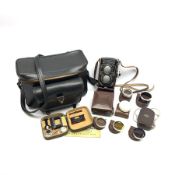 Rolleiflex 2.8F camera in leather case together with; 'In Practical Use' instruction manual, Rolleip