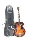 Gibson L-12 acoustic guitar No. A741 in carrying case (frets missing)