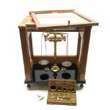 Brass laboratory scales by Stanton Instruments Ltd. Model No. C.B.3, in glazed mahogany cabinet with