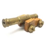 Brass model of a cannon on oak sled, the barrel 15cm, impressed TS A8