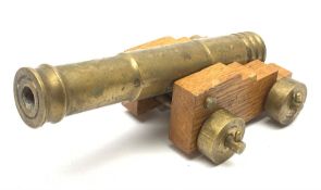 Brass model of a cannon on oak sled, the barrel 15cm, impressed TS A8