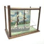 Victorian scratch built water-line model of a two-masted sailing ship with wooden hull and furled sa