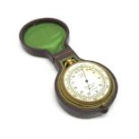 Early 20th century pocket barometer with gilt brass case, the white dial inscribed 'Compensated for