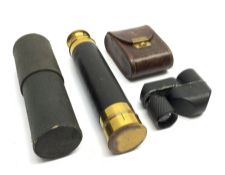 Early 20th century brass and leather three-draw pocket telescope, cased, L41.5cm fully extended; and