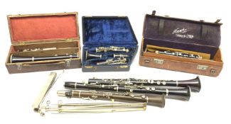 Six clarinets comprising Hawkes & Son No. 9026 in leather case, unmarked E-flat bakelite, Hawkes &