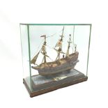 Stamp montage model of the galleon Ark Royal by Mr. G.R. Inch of Scarborough L24cm H23cm with stand