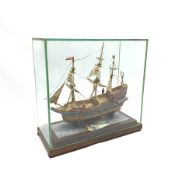 Stamp montage model of the galleon Ark Royal by Mr. G.R. Inch of Scarborough L24cm H23cm with stand