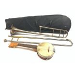 Hawkes & Son 'Artist's Perfected' silver-plated trombone with mouthpiece, no. 57481, L117cm in dama