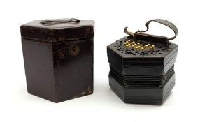 19th century rosewood concertina of hexagonal form with fretworked ends, thirty-nine lettered bone