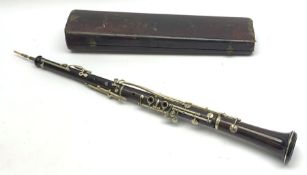 Rosewood three-piece oboe with nickel mounts, unmarked, cased