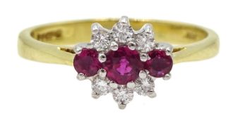 18ct gold ruby and diamond cluster ring, hallmarked