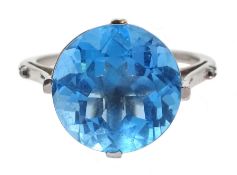 9ct white gold round Swiss blue topaz ring, the shank set with two blue diamond chips, hallmarked