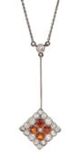 Early 20th century 18ct white gold, milgrain set old cut diamond and orange garnet pendant, on silve