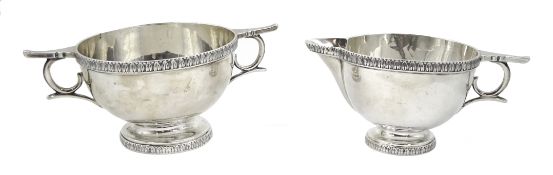 Early 20th century twin handled sugar bowl and matching cream jug by Walker & Hall, Sheffield 1911,