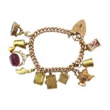9ct gold curb link chain bracelet, with heart padlock, eight 9ct gold charms including swivel fob, b
