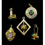 Two 18ct gold stone set swivel and rose quartz lantern and three 16ct gold stone set charms, all tes