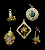 Two 18ct gold stone set swivel and rose quartz lantern and three 16ct gold stone set charms, all tes