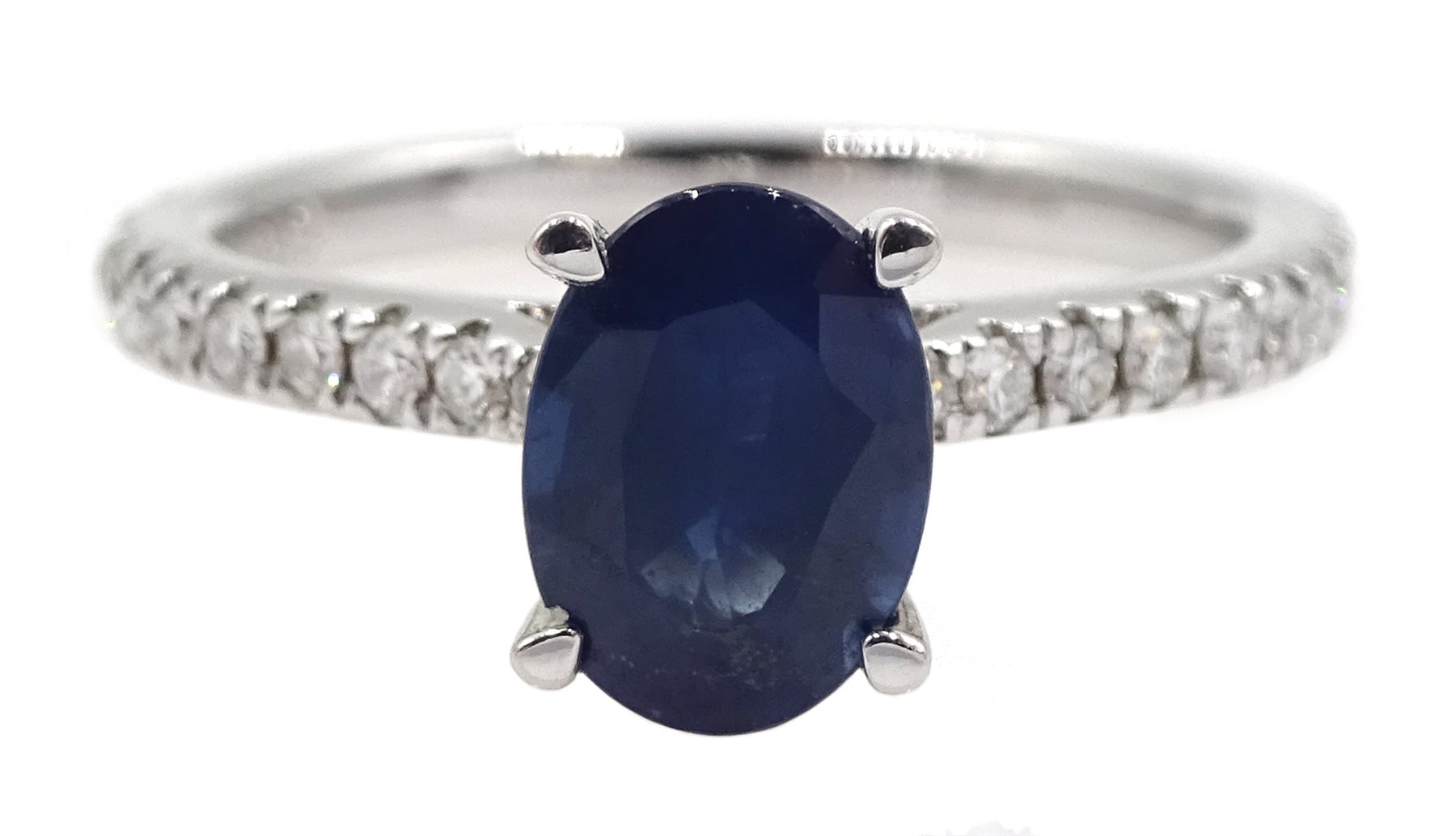 18ct white gold oval sapphire ring, with diamond set shoulders hallmarked, sapphire approx 1.35 cara