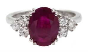 18ct gold oval ruby and six round brilliant cut diamond ring, hallmarked, ruby approx 1.60 carat