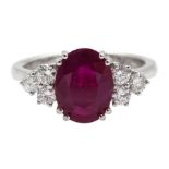 18ct gold oval ruby and six round brilliant cut diamond ring, hallmarked, ruby approx 1.60 carat