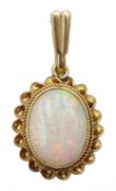 9ct gold oval opal pendant, hallmarked