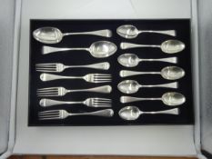 Part canteen of Victorian silver to include two serving spoons, seven dessert spoons, five dinner fo