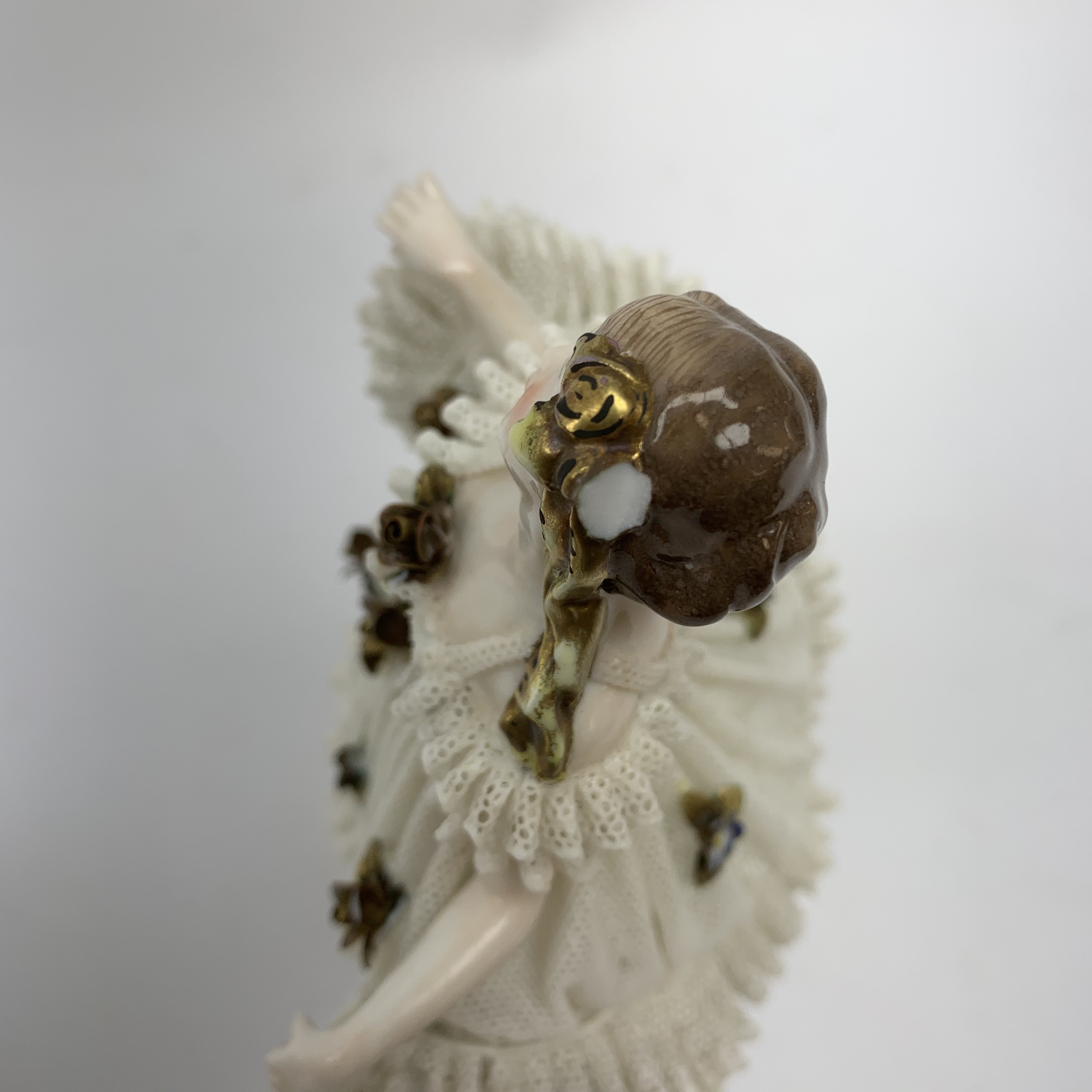 A 20th century Sitzendorf porcelain figurine, modelled in lace dress detailed with gilt flowers and - Image 8 of 8