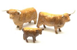 A Beswick Highland Bull, Highland Cow, and Highland Calf, each with printed mark beneath.