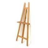 A pine floor standing artist's easel, approximately H160cm.