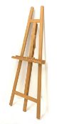 A pine floor standing artist's easel, approximately H160cm.